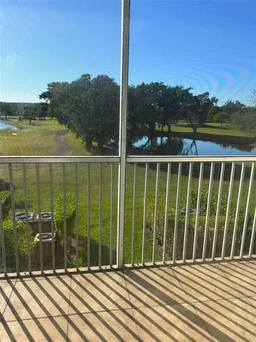 a garden view with a lake view