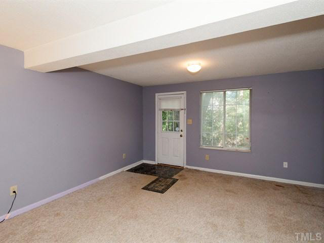 7722 Bernadette Lane Raleigh, NC 27615 - Photo 15 of 23 an empty room with windows