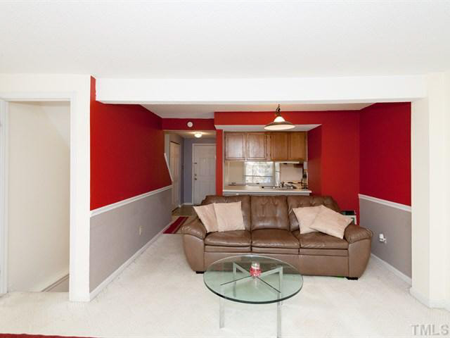 7722 Bernadette Lane Raleigh, NC 27615 - Photo 7 of 23 a living room with furniture