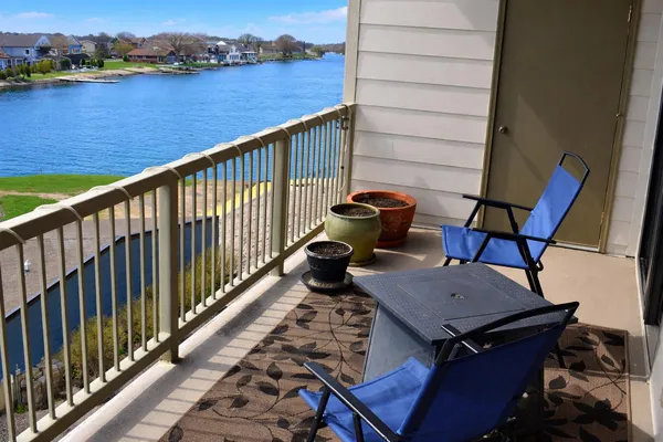 a view of balcony with furniture