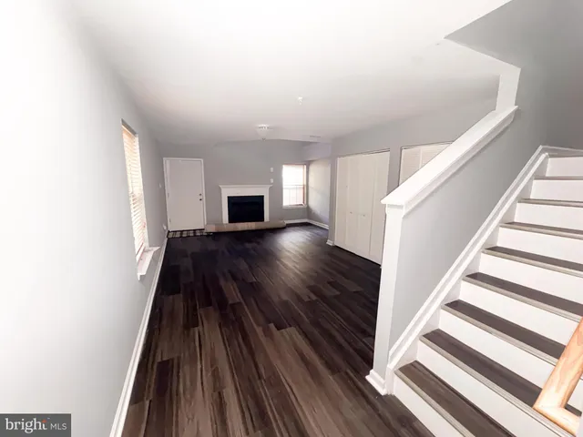 a view of entryway with wooden floor