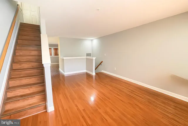 a view of entryway with wooden floor