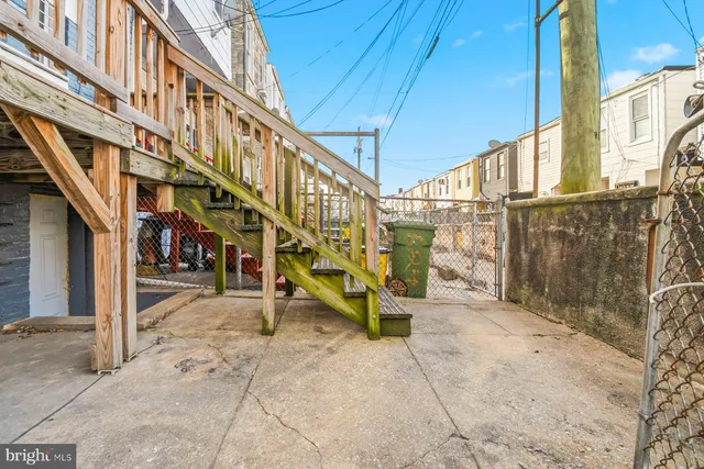 a view of a balcony with wooden floor