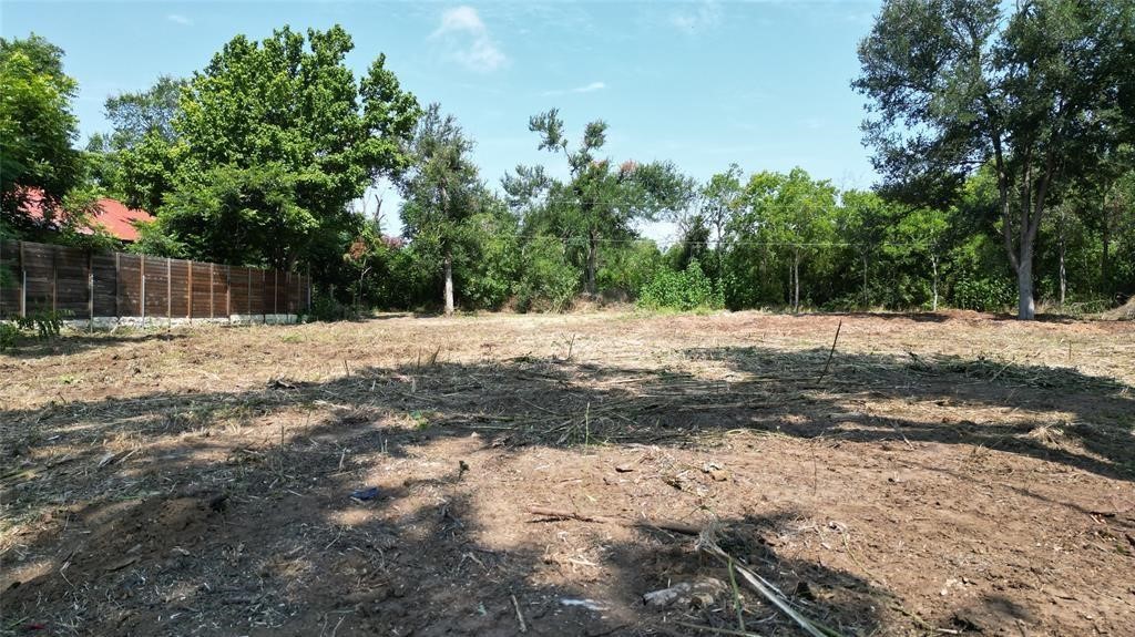 Tbd Arthur Street Elgin, TX 78621 - Photo 12 of 15 a street view covered with trees
