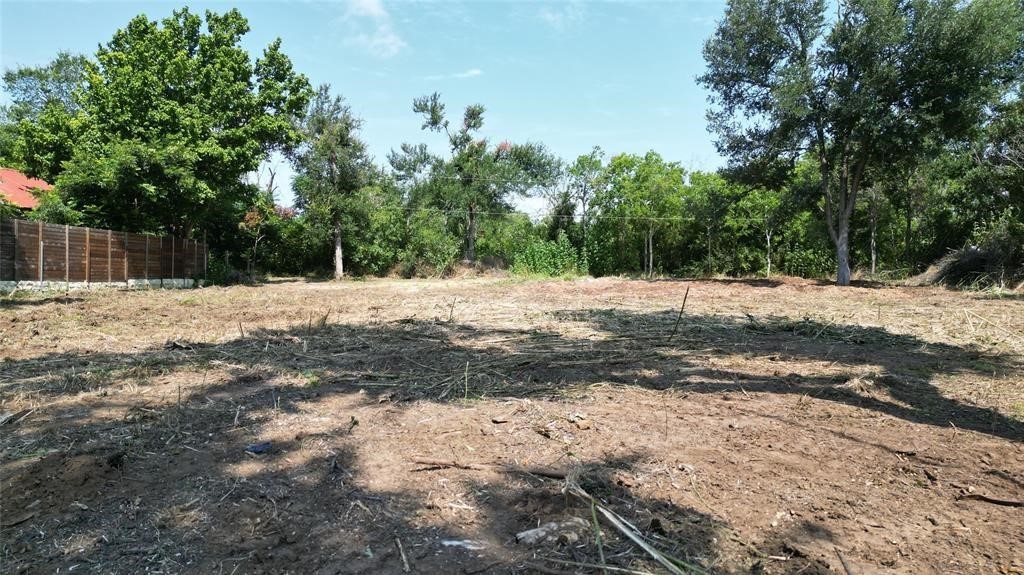 Tbd Arthur Street Elgin, TX 78621 - Photo 13 of 15 a wooden bench with view of trees
