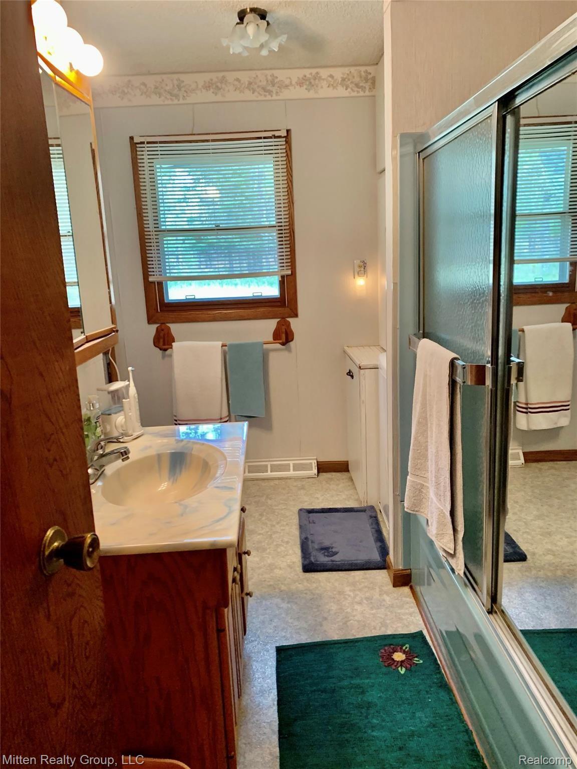 3052 Lovells Road Grayling, MI 49738 - Photo 15 of 20 Bathroom | Laundry is on right past bath tub