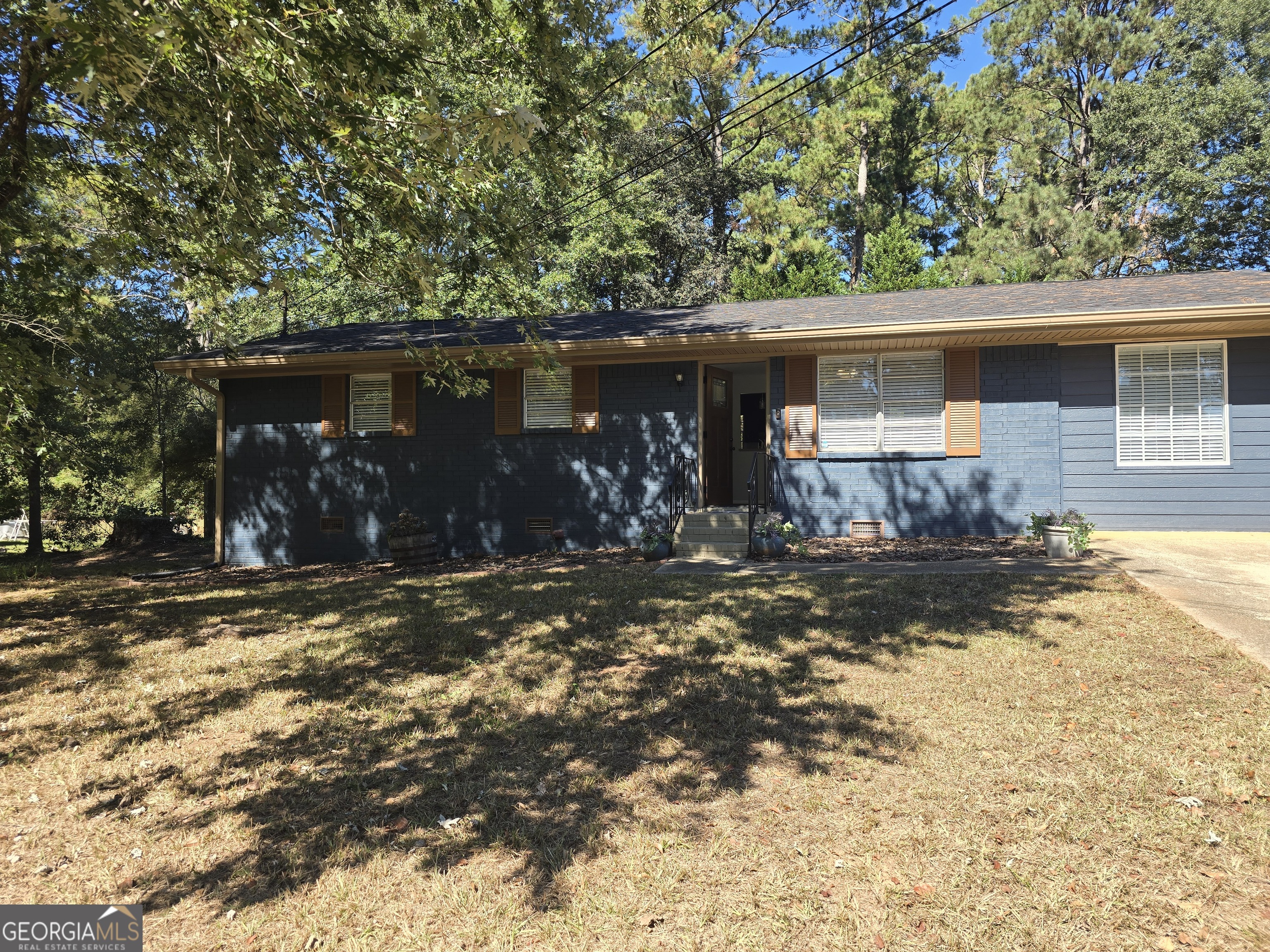 205 Emory Way Oxford, GA 30054 - Photo 16 of 18 a view of a back yard of the house