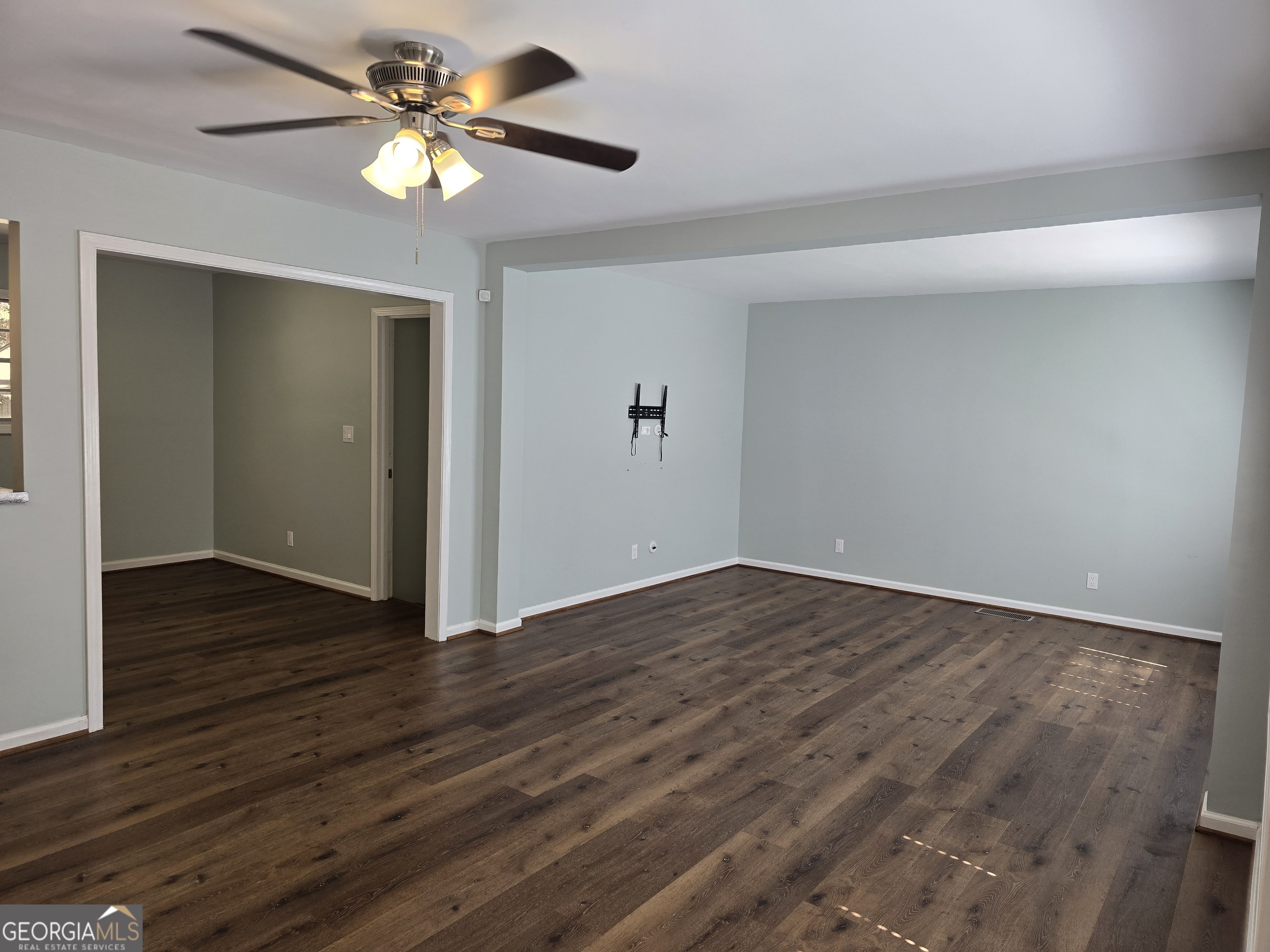 205 Emory Way Oxford, GA 30054 - Photo 6 of 18 wooden floor in an empty room