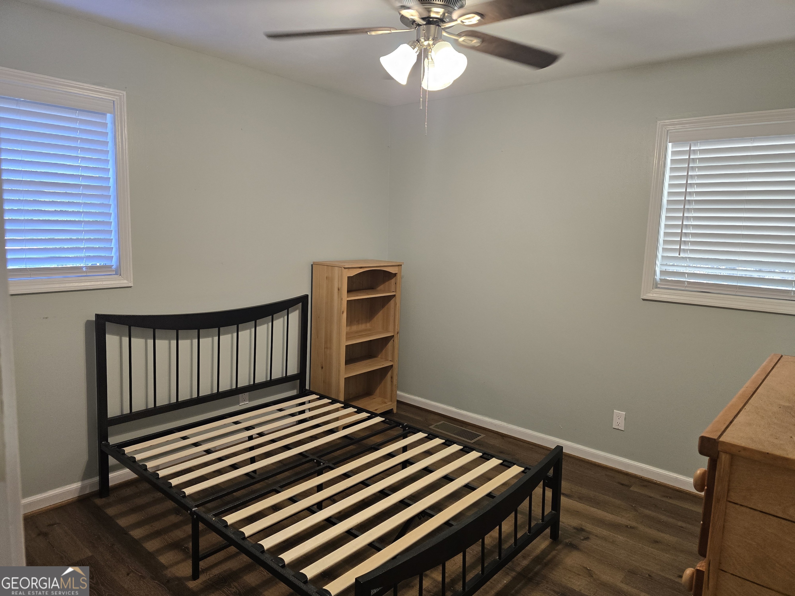 205 Emory Way Oxford, GA 30054 - Photo 10 of 18 a view of room with stairs and wooden floor
