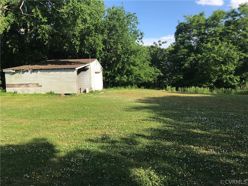 511 Riverview Road Colonial Heights, VA 23834 - Photo 16 of 17 a view of a big yard with large trees
