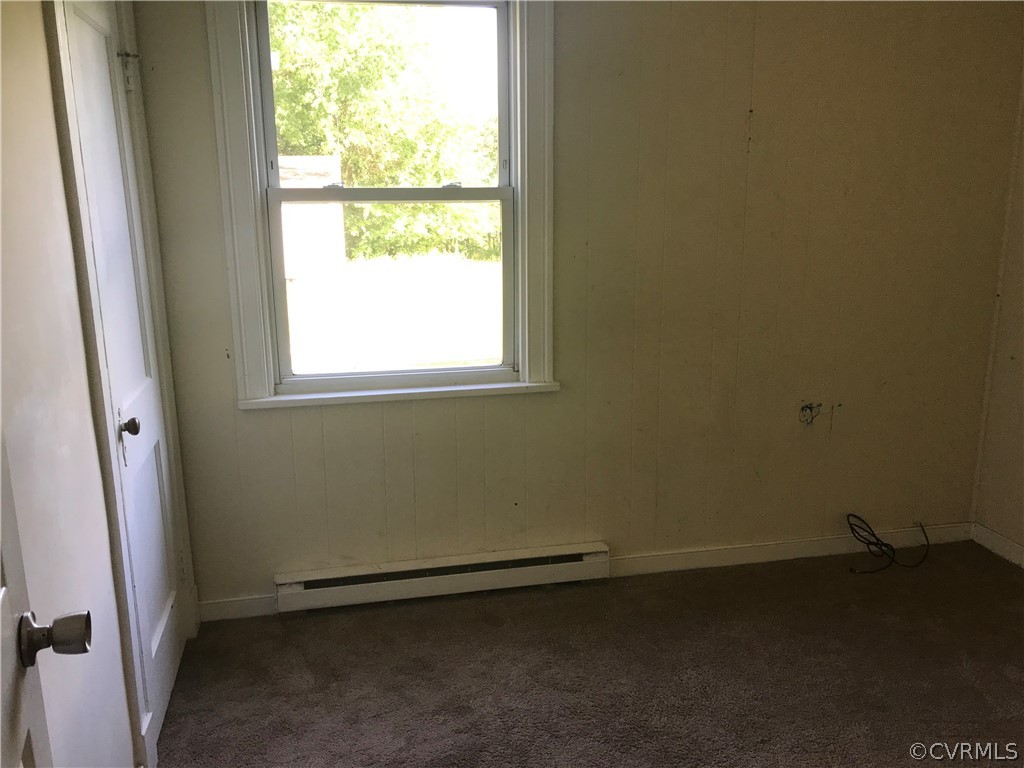 511 Riverview Road Colonial Heights, VA 23834 - Photo 8 of 17 an empty room with a window