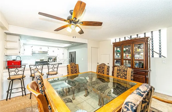 a kitchen with cabinets stainless steel appliances and a sink