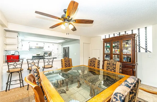 a kitchen with cabinets stainless steel appliances and a sink