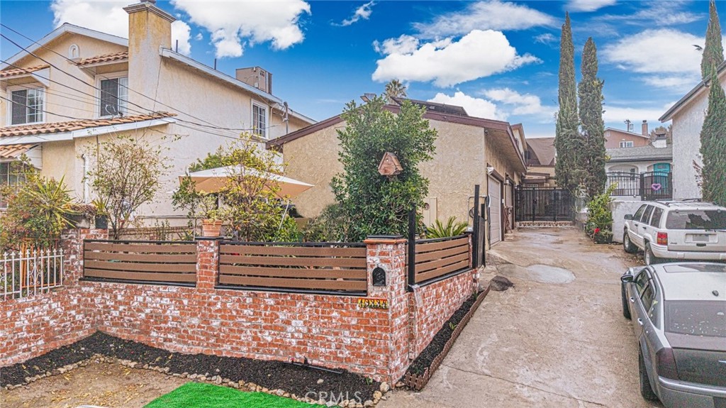 10334 Big Tujunga Canyon Road Tujunga, CA 91042 - Photo 3 of 39 a view of a porch with a bench