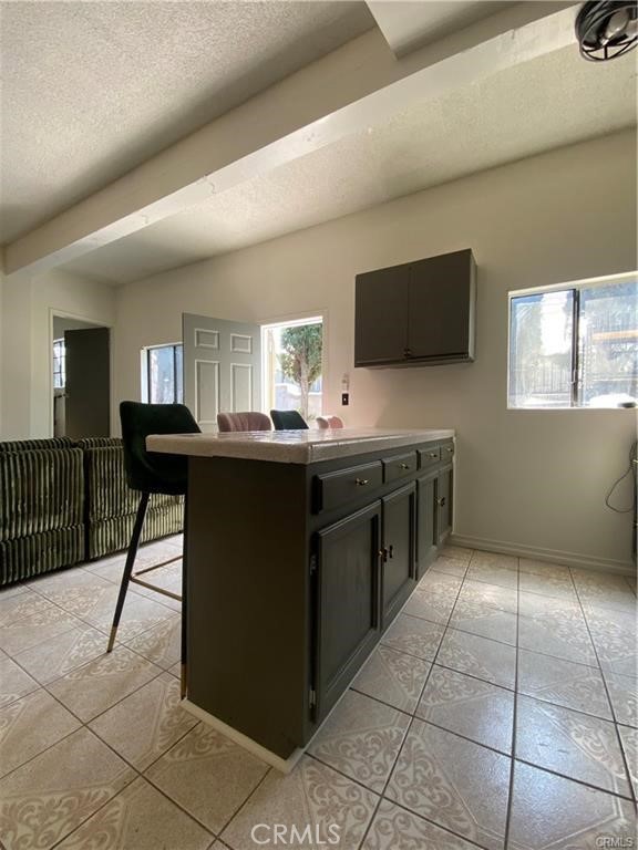 10334 Big Tujunga Canyon Road Tujunga, CA 91042 - Photo 5 of 39 a kitchen with a cabinets and a table