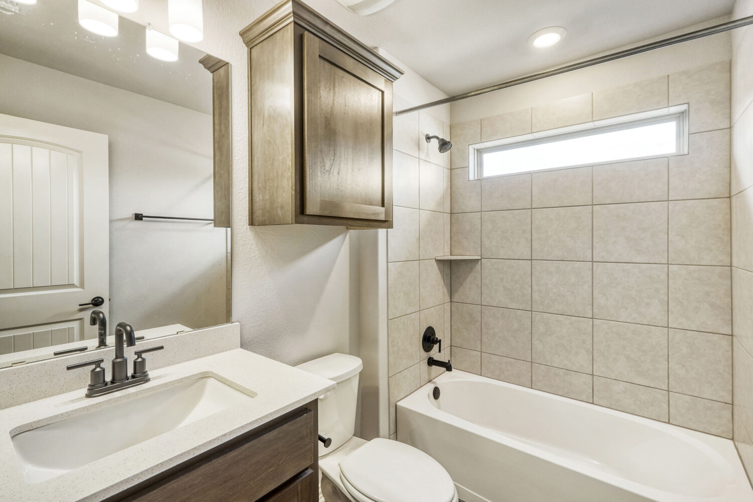 426 Cold Riv Run Kyle, TX 78640 - Photo 13 of 24 Full bathroom with vanity and bathtub / shower combination