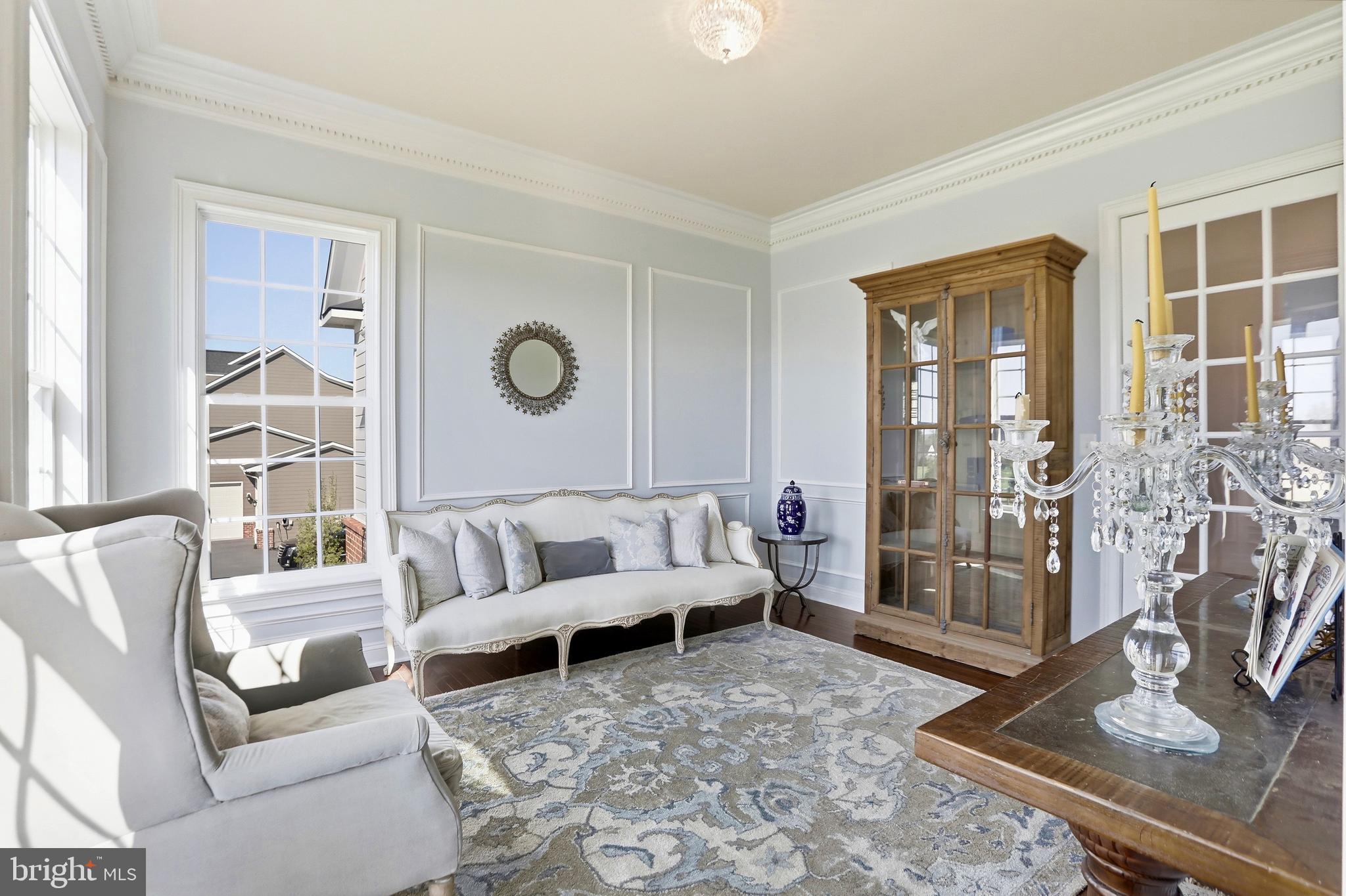 36972 Bridle Ridge Lane Purcellville, VA 20132 - Photo 22 of 44 a living room with furniture and a large window