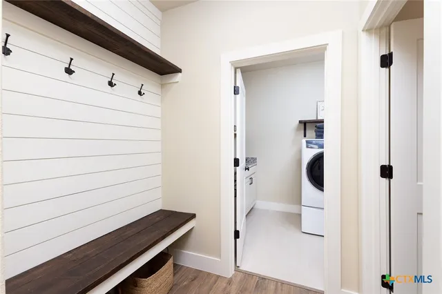 a utility room with dryer and washer