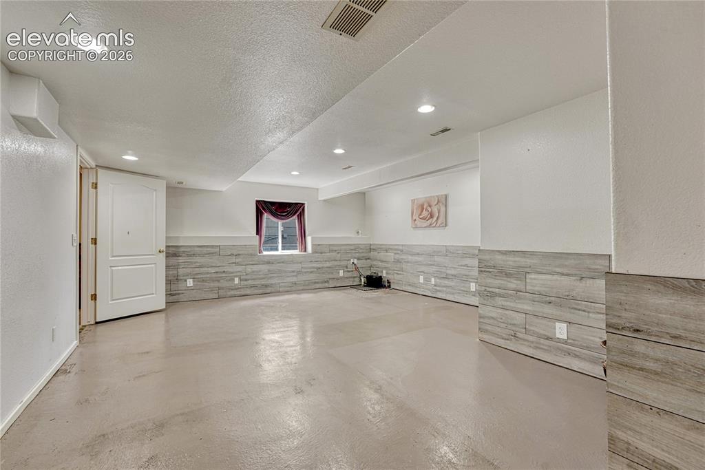 7285 Julynn Road Colorado Springs, CO 80919 - Photo 25 of 45 a view of an empty room
