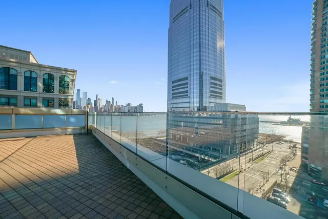 a view of city with tall buildings