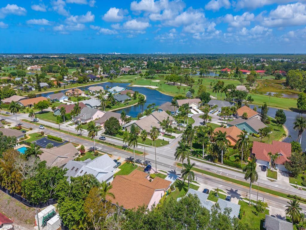 472 St Andrews Boulevard Naples, FL 34113 - Photo 3 of 18 an aerial view of multiple house