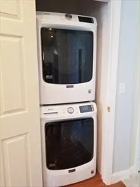 a close up view of a washer and dryer