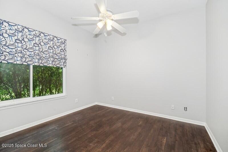 2739 Harlock Road Melbourne, FL 32934 - Photo 11 of 15 12_2739HarlockRd_153_2ndBedroom_FlexMLS8