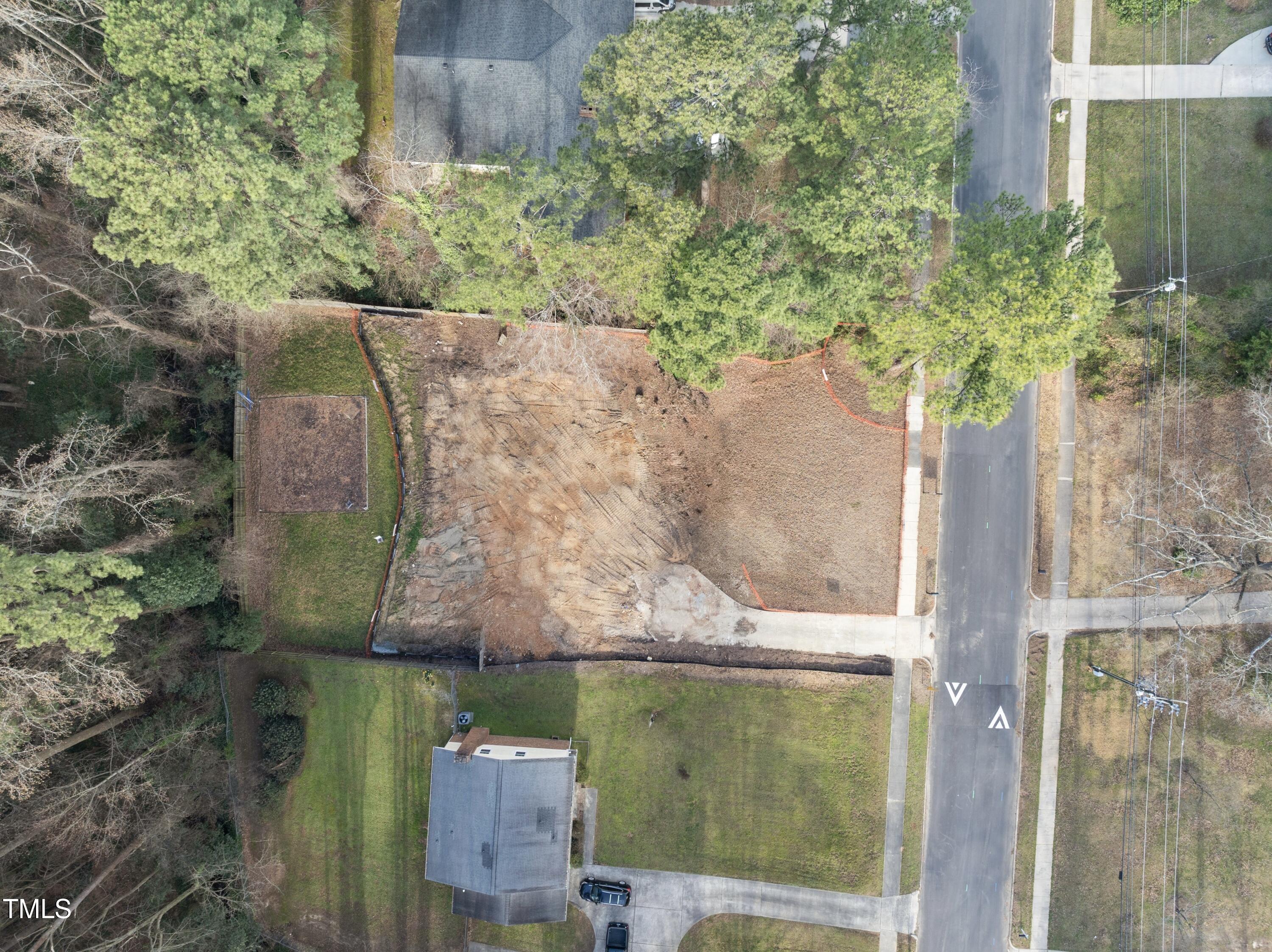 216 Dartmouth Road Raleigh, NC 27609 - Photo 5 of 5 an aerial view of a residential houses with outdoor space