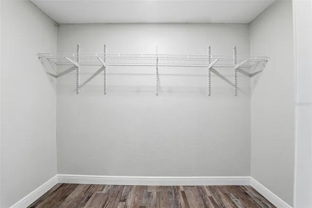 a view of small space with racks on the wall