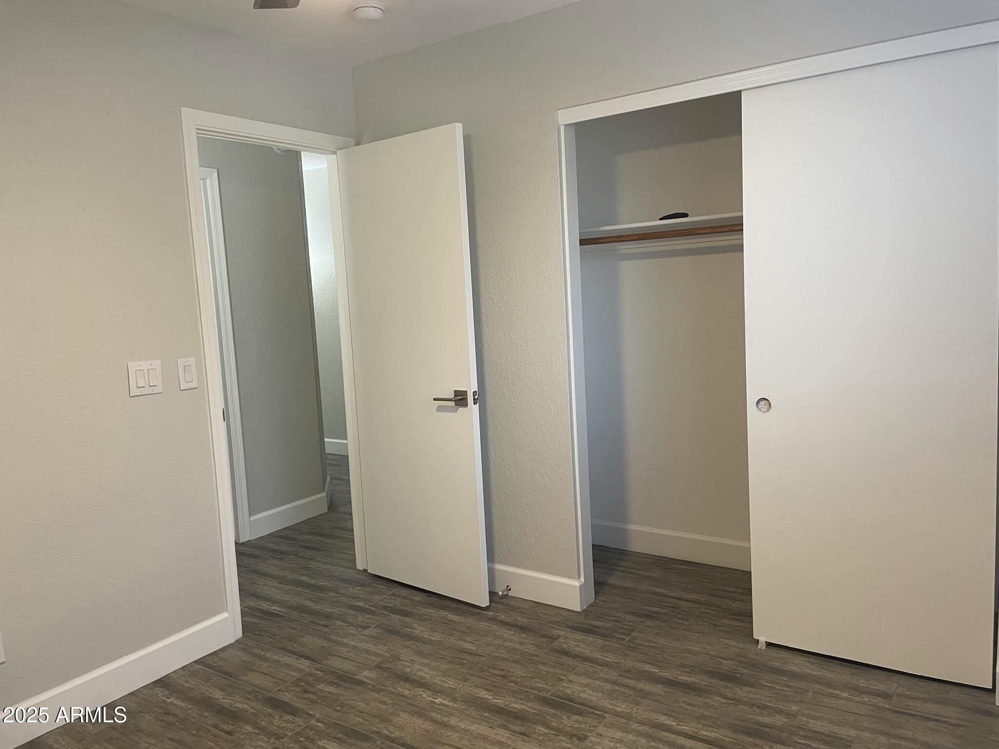 839 West 12th Avenue Apache Junction, AZ 85120 - Photo 17 of 26 a view of wooden floor in a room