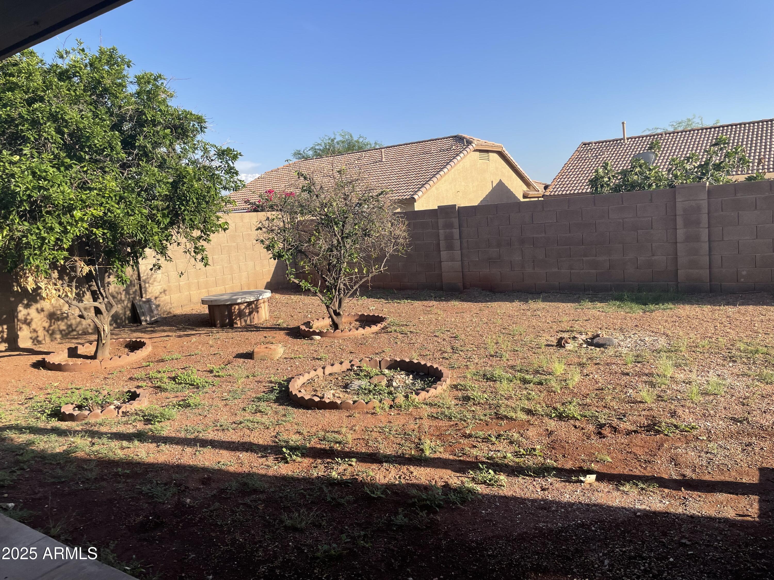 839 West 12th Avenue Apache Junction, AZ 85120 - Photo 25 of 26 a view of a yard covered with snow