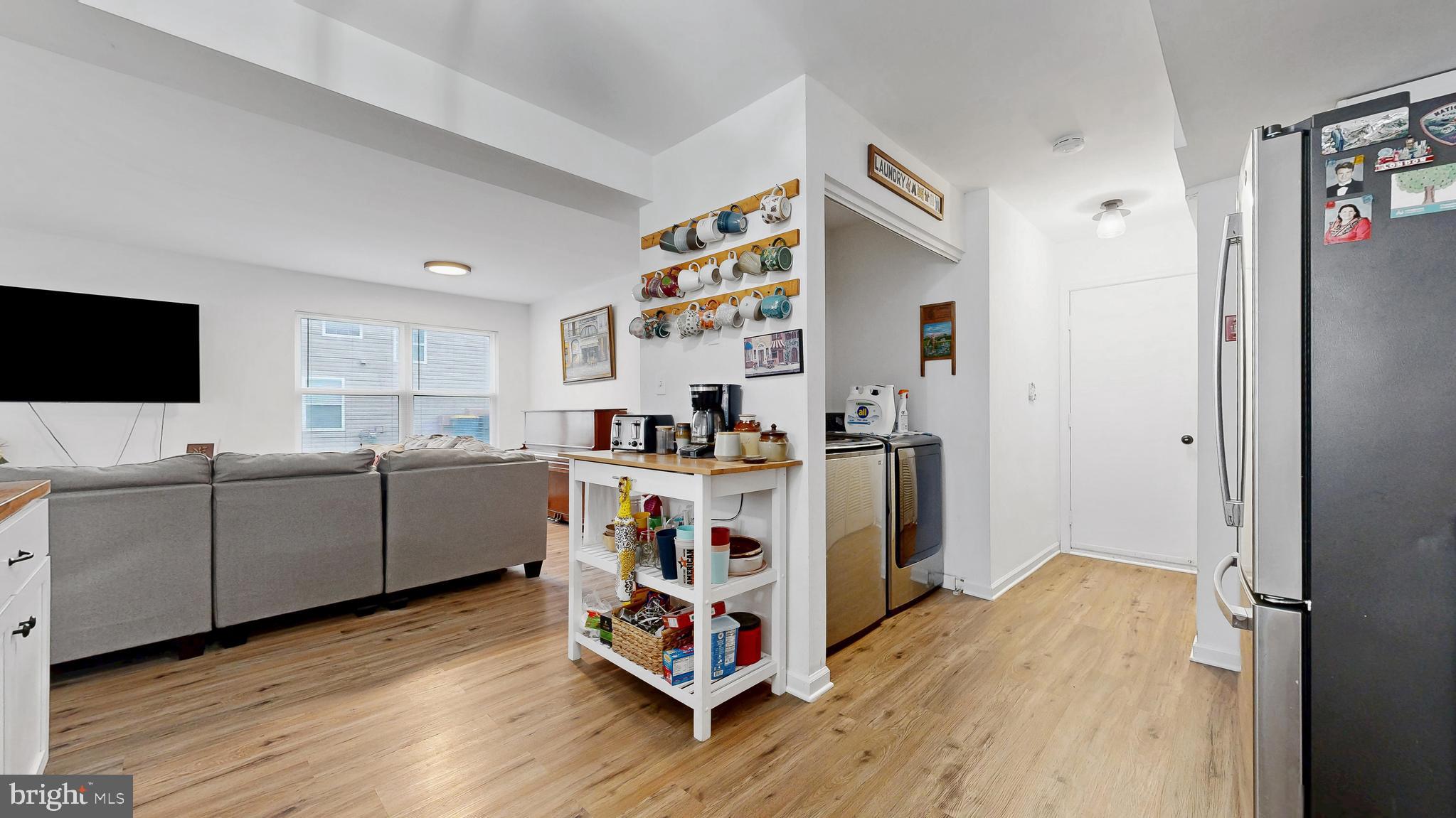 433 East Wind Drive Dover, DE 19901 - Photo 21 of 61 a bed room with furniture and a flat screen tv