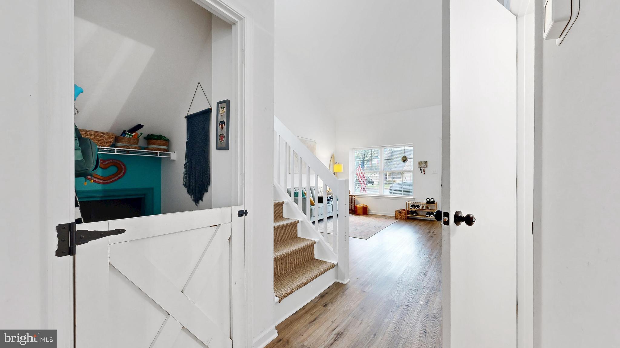 433 East Wind Drive Dover, DE 19901 - Photo 26 of 61 a view of a living room washer and dryer