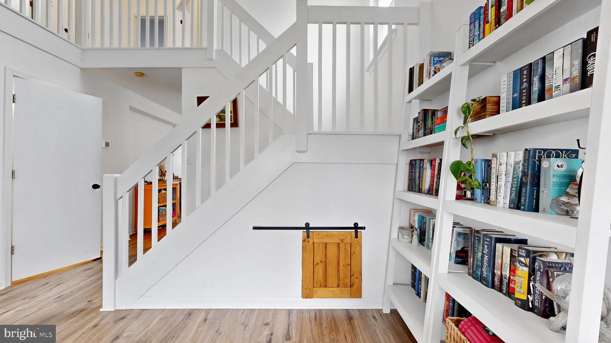 433 East Wind Drive Dover, DE 19901 - Photo 28 of 61 a view of an entryway with workspace and toys