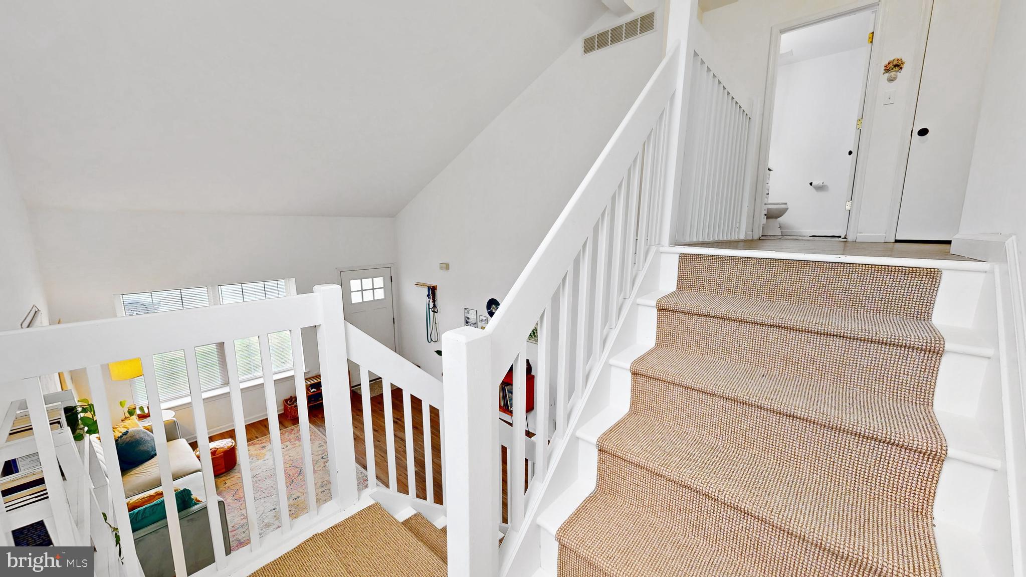 433 East Wind Drive Dover, DE 19901 - Photo 30 of 61 a view of an entryway with lots of frames and frames on wall