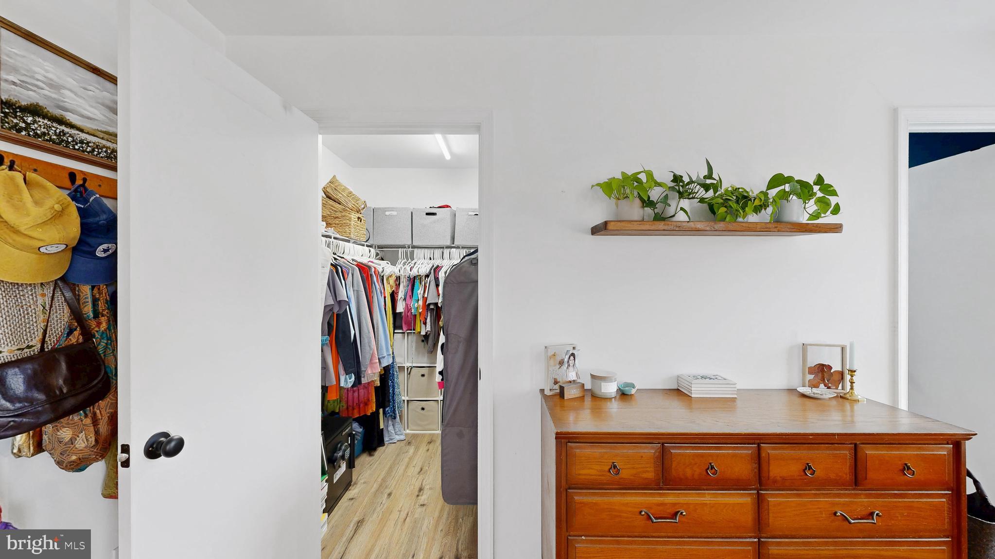 433 East Wind Drive Dover, DE 19901 - Photo 38 of 61 a view of walk in closet with clothes