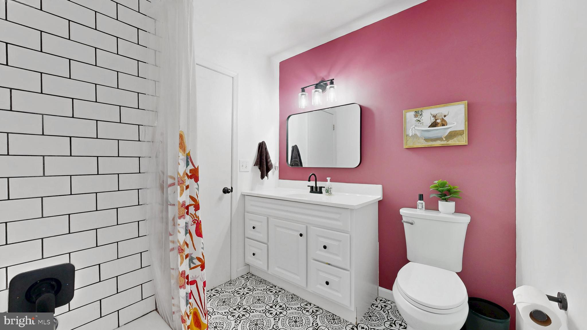 433 East Wind Drive Dover, DE 19901 - Photo 43 of 61 a bathroom with a sink mirror vanity and toilet