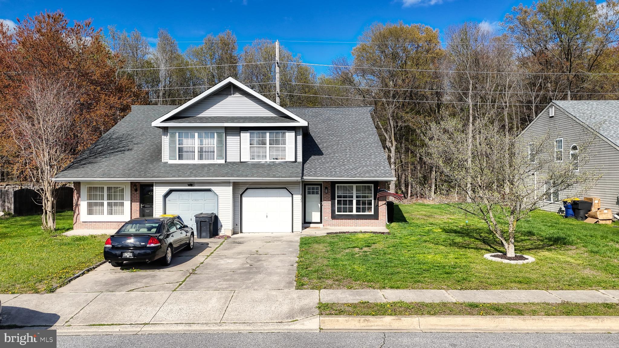433 East Wind Drive Dover, DE 19901 - Photo 56 of 61 a front view of a house with garden