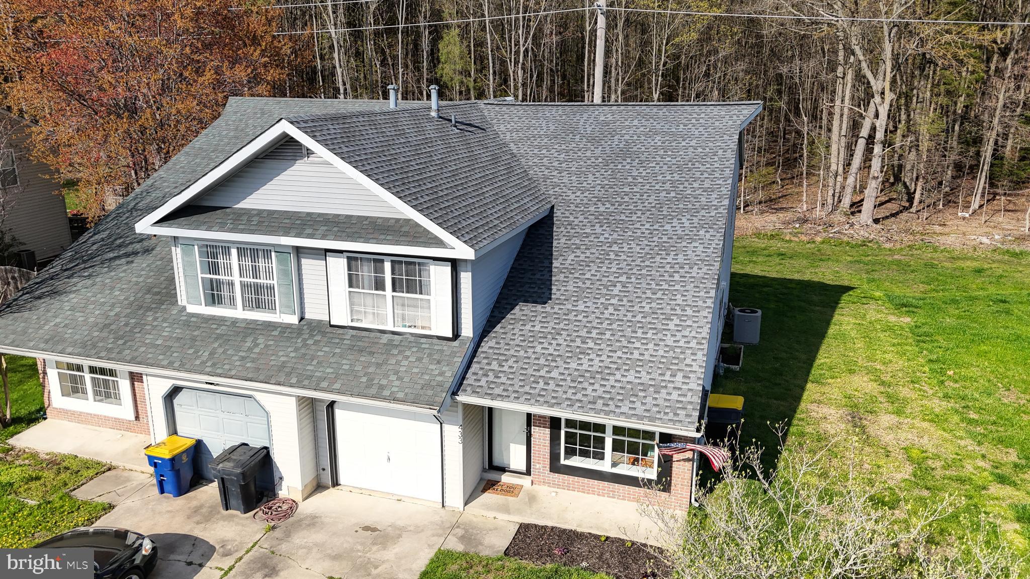433 East Wind Drive Dover, DE 19901 - Photo 57 of 61 a aerial view of a house with a yard