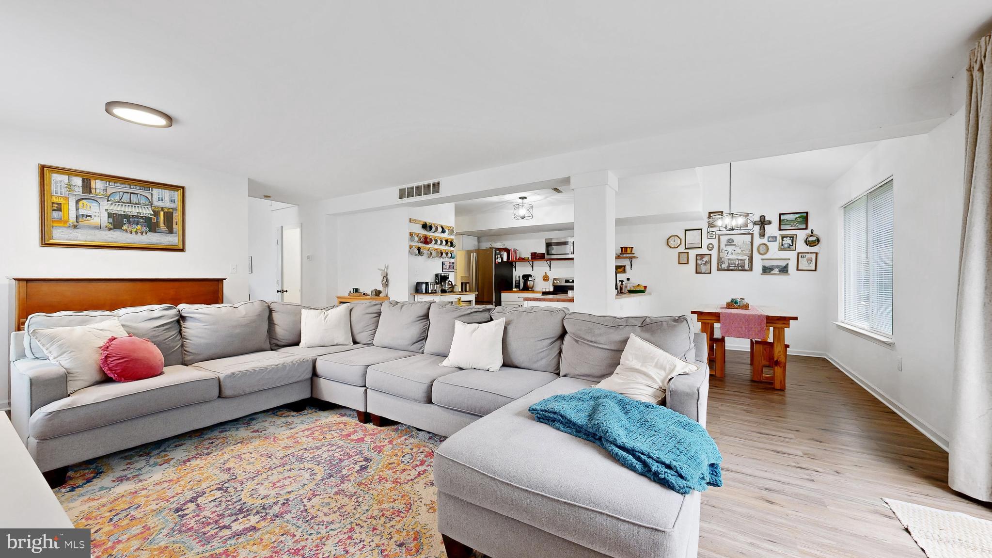 433 East Wind Drive Dover, DE 19901 - Photo 8 of 61 a living room with furniture and a couch