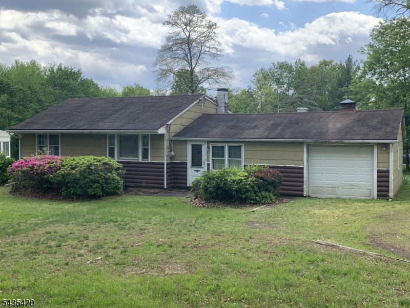 619 Foothill Road Bridgewater, NJ 08807 - Photo 5 of 23 a view of a house with garden and a tree