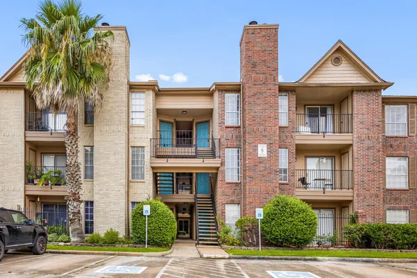 a front view of a multi story residential apartment building