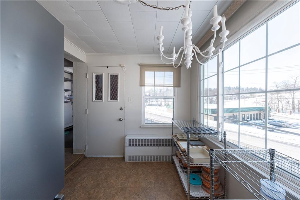 61 West Prospect Avenue Washington, PA 15301 - Photo 19 of 47 a spacious bedroom with a bed and a window