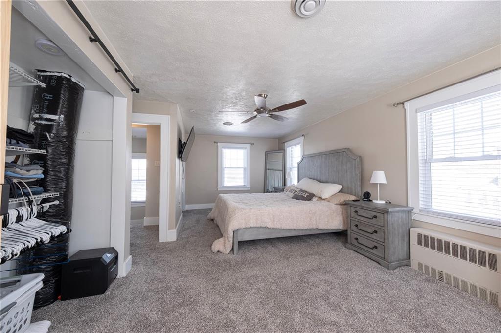 61 West Prospect Avenue Washington, PA 15301 - Photo 20 of 47 a spacious bedroom with a bed and a window
