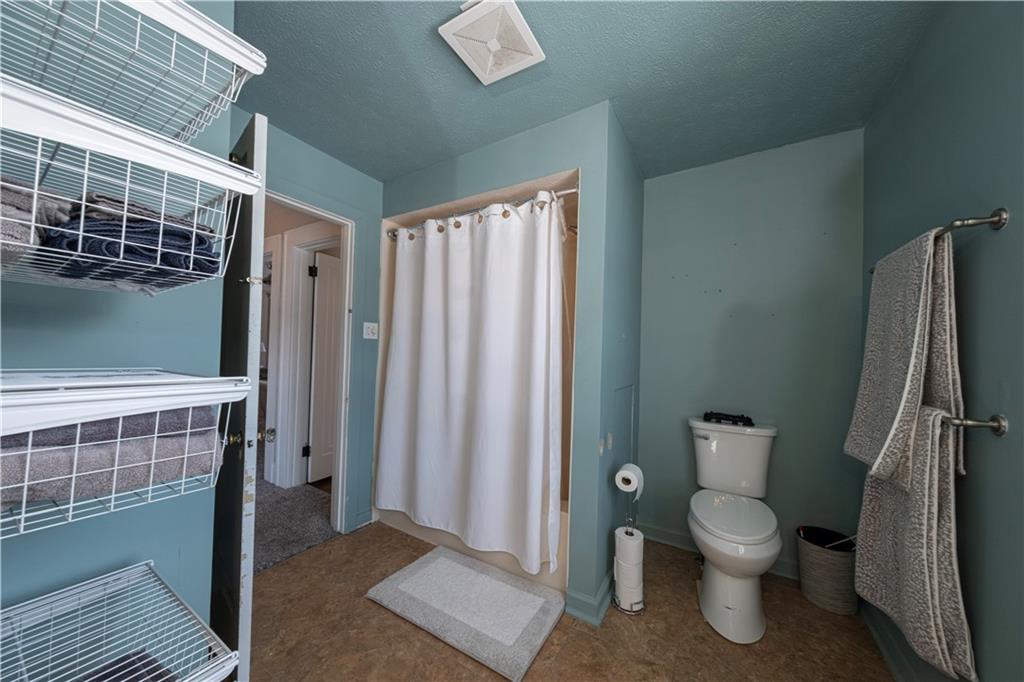 61 West Prospect Avenue Washington, PA 15301 - Photo 23 of 47 a bathroom with a toilet and a shower