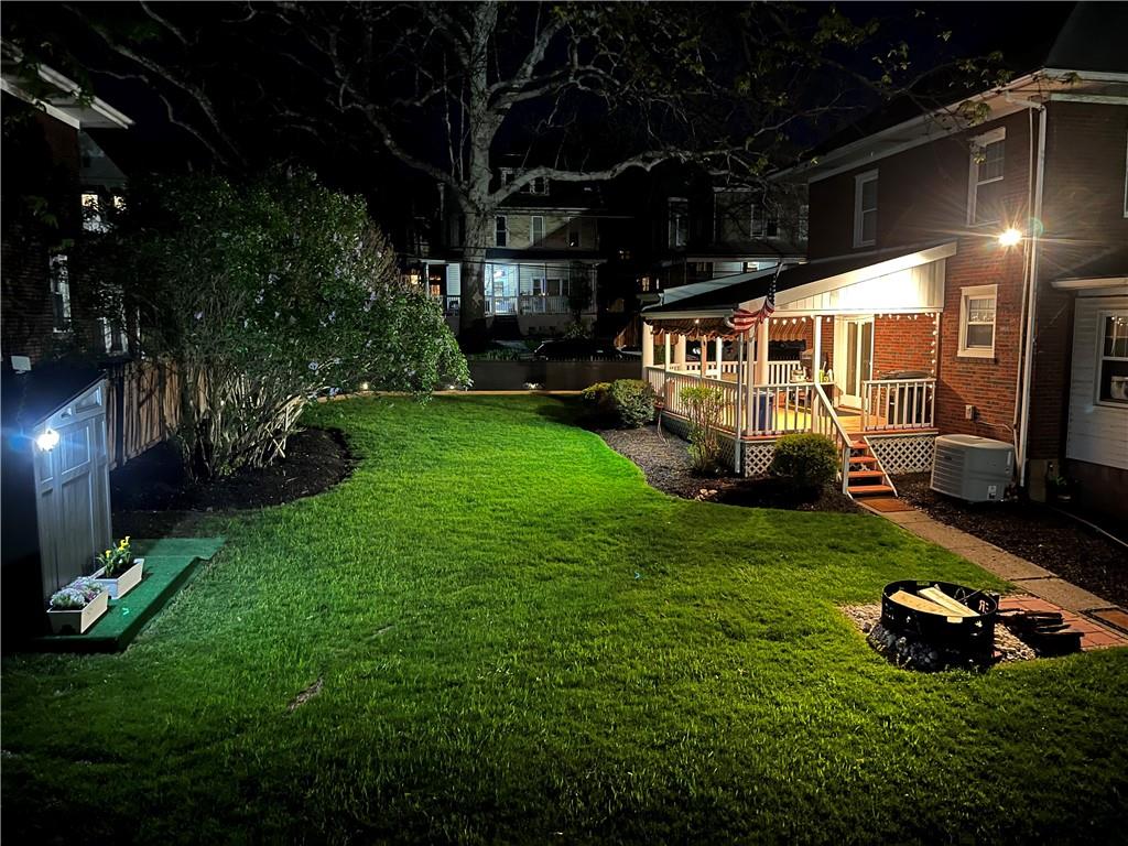 61 West Prospect Avenue Washington, PA 15301 - Photo 42 of 47 a view of a porch with a yard fire pit and couches