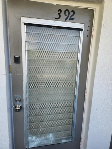 a view of a refrigerator in a room