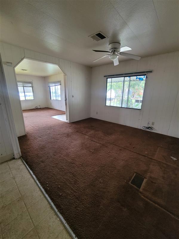 395 Brannan Island Road, Unit 1 Isleton, CA 95641 - Photo 4 of 8 wooden floor in an empty room with a window