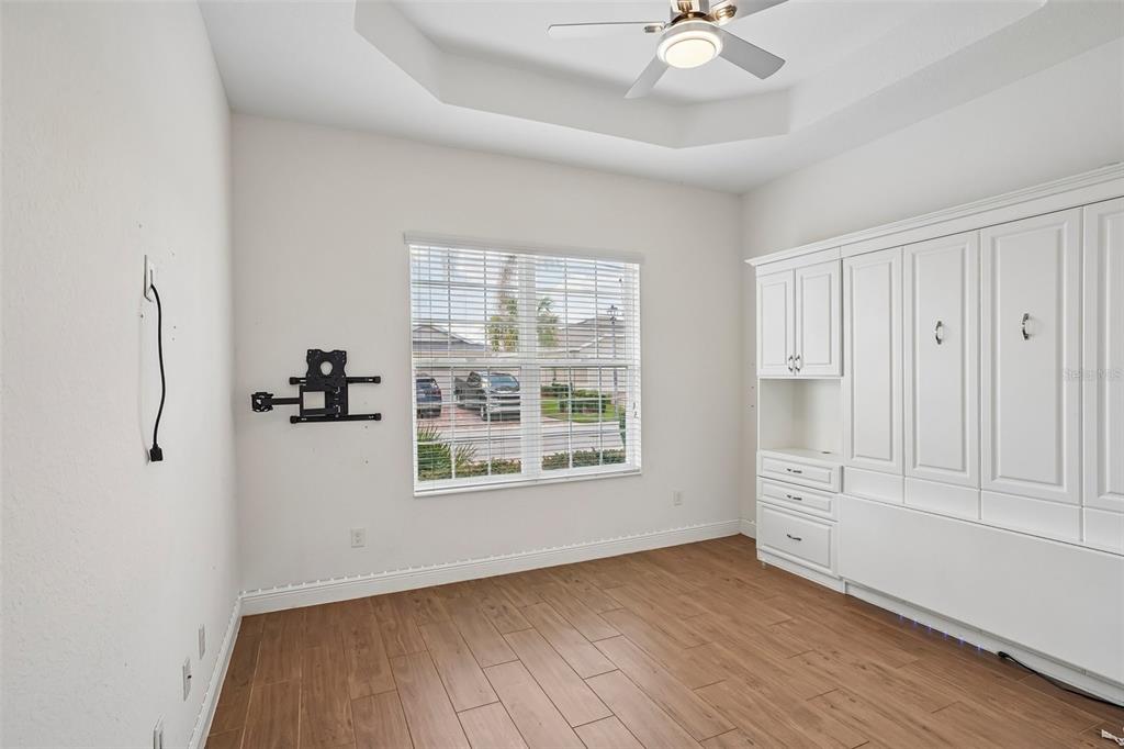 10339 Addison Shore Way Oxford, FL 34484 - Photo 45 of 54 a view of an empty room with a window