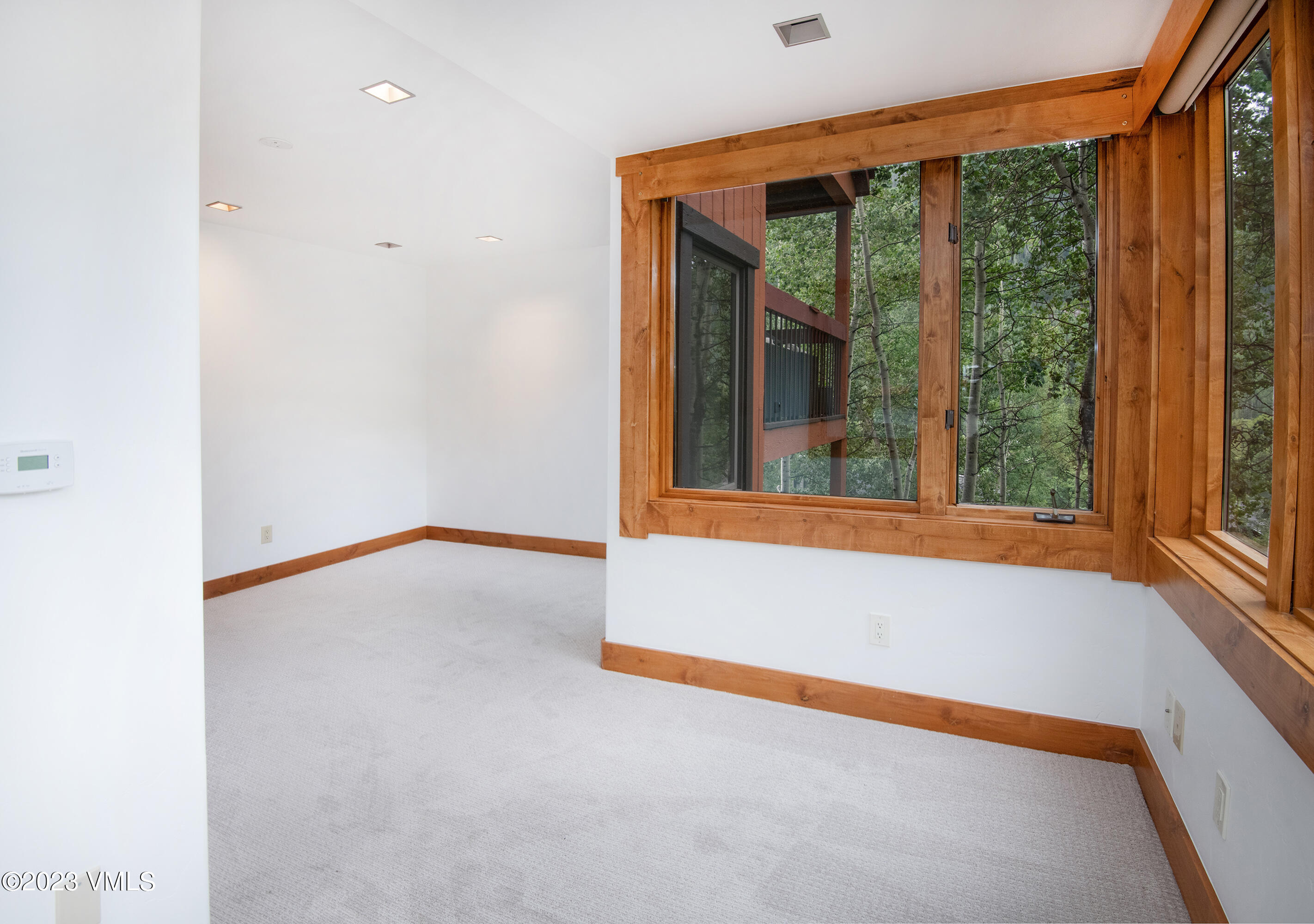 3094 Booth Falls Road, Unit 17 Vail, CO 81657 - Photo 15 of 27 a view of an empty room with a window